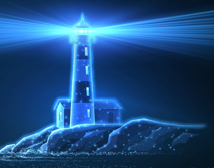 A light house is lit up at night.